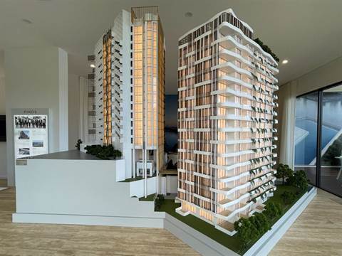 Maquette van twee woontorens in een verkoopruimte